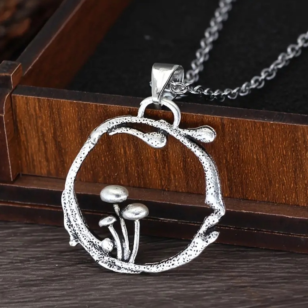 Silver Pendant Necklace with Nature-Inspired Design